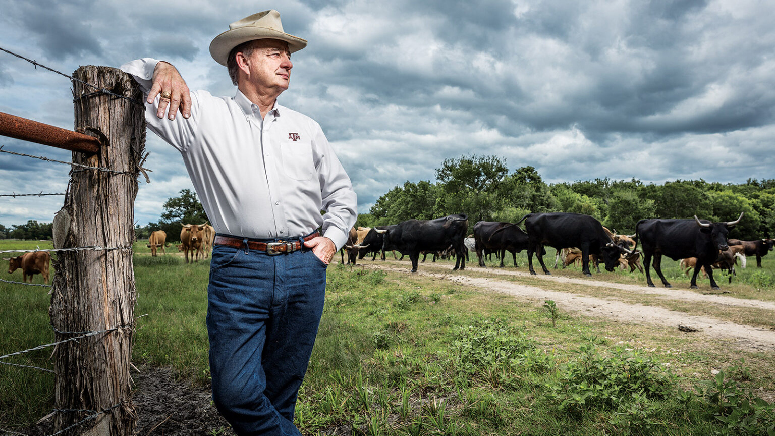 John Sharp from Texas A&M standing on a ranch