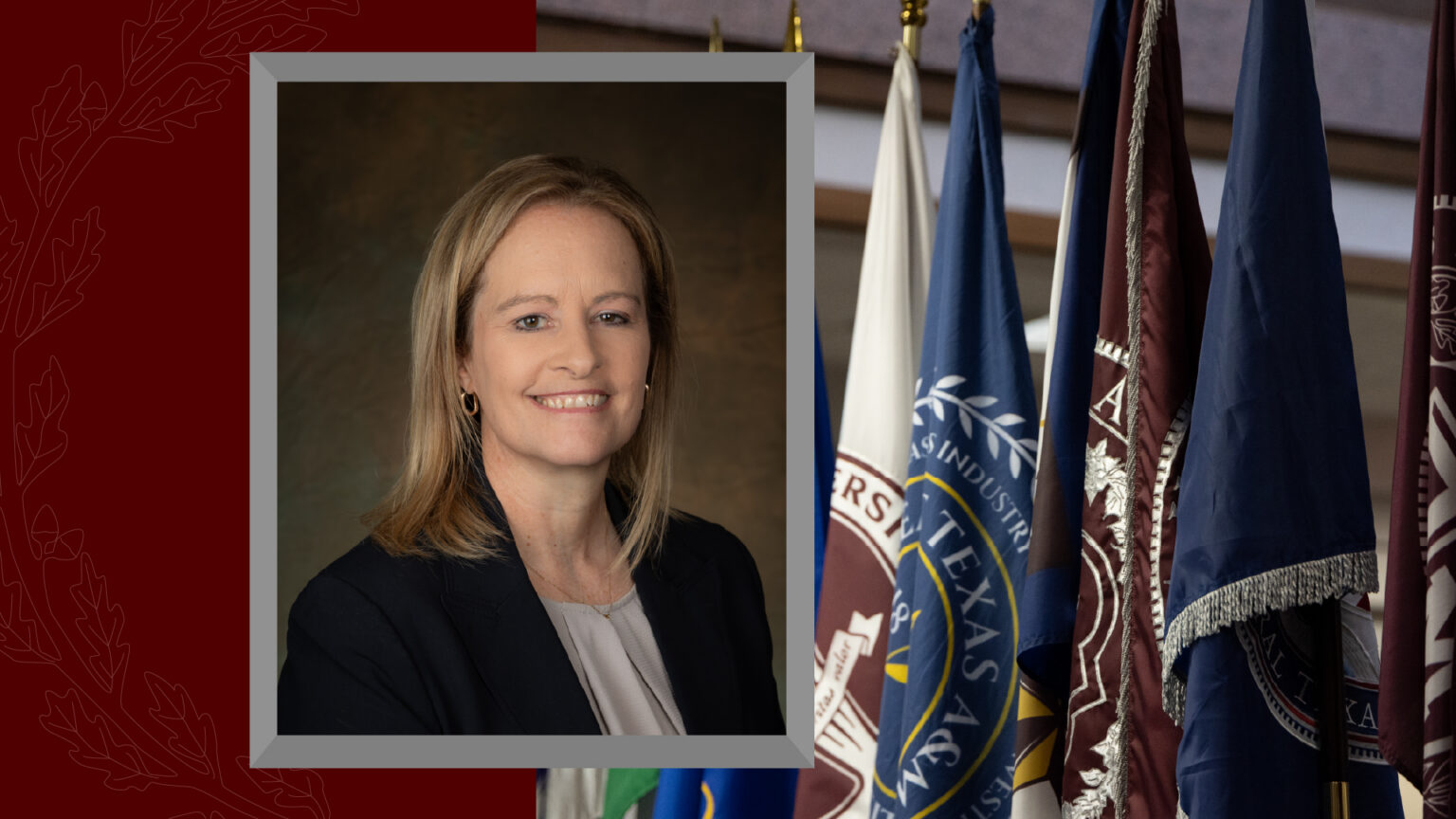 A cropped headshot of Executive Vice Chancellor Tracy Foster on a background photo of the Texas A&M University flags.