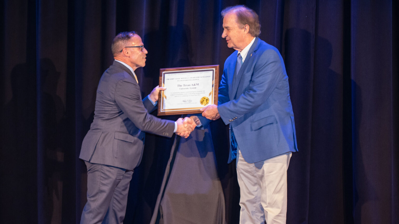 Major General Daniel J. Lecce presenting Chancellor John Sharp with the Jack Donnelly Award for Excellence in Counterintelligence.