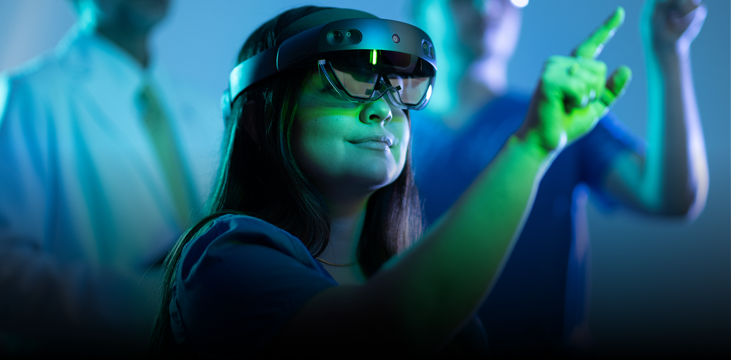 A woman using a virtual reality headset.
