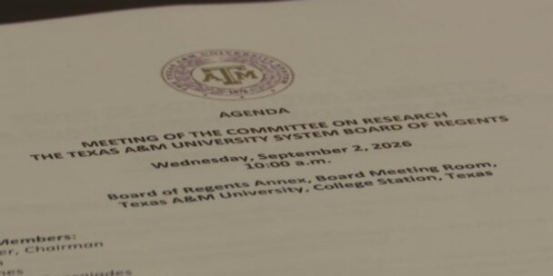 Document laid on a table with the word "Agenda" in the header.